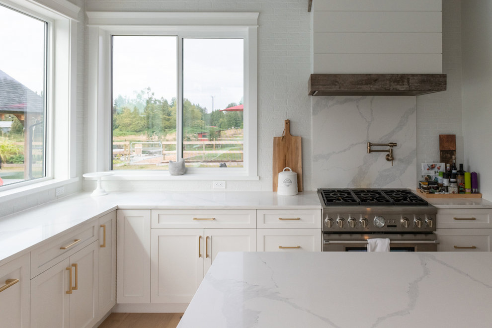 View of kitchen with Anlin glass packages