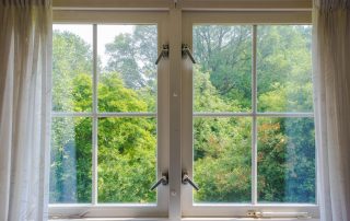 Stay Cool This Summer: How New Windows Improve Home Energy Efficiency