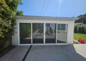 American Deluxe Windows and Doors recently had the pleasure of replacing three outdated black sliding patio doors with beautiful white vinyl doors at a home in Los Angeles, CA.